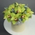 Композиция в шляпной коробке из 11 лаймовых орхидей в Дедовске Композиция в шляпной коробке из 11 лаймовых орхидей в Дедовске